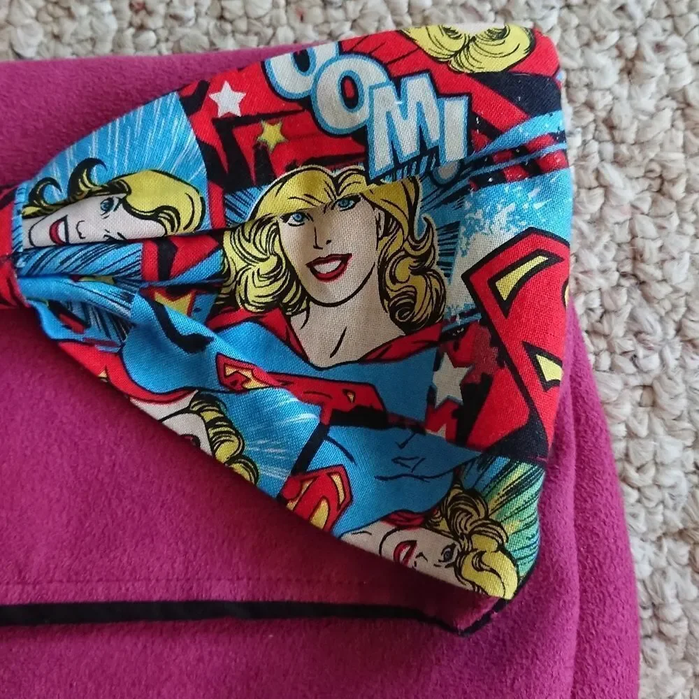 Superwoman bow clutch in Magenta